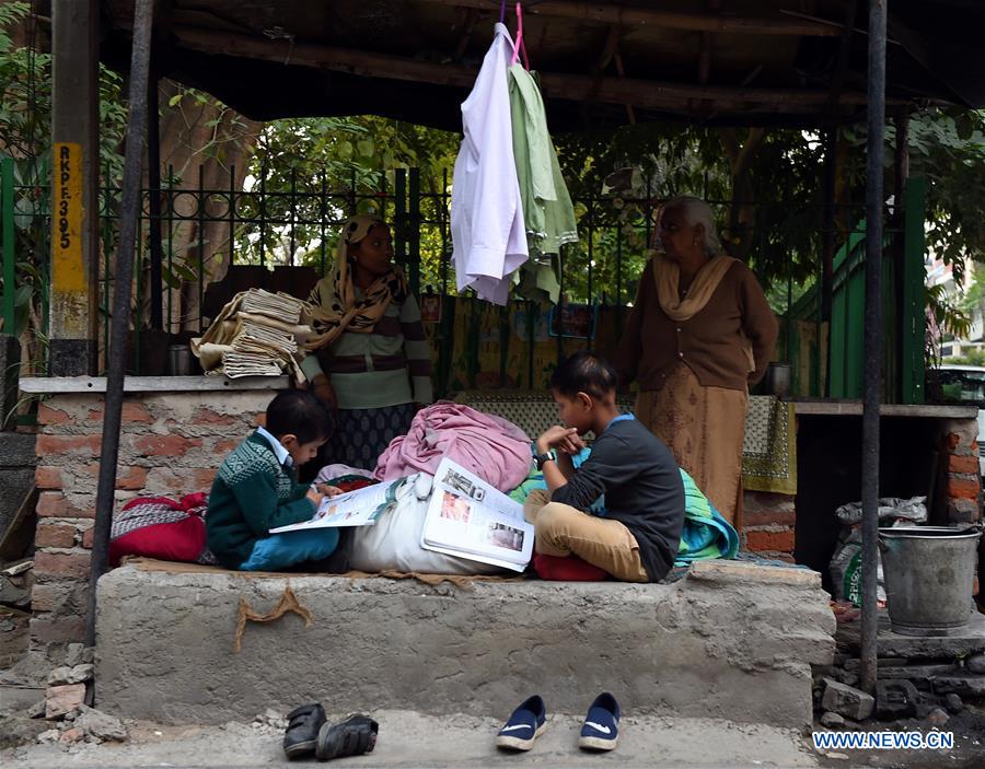 INDIA-NEW DELHI-CLOTHES-IRONING STAND