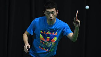 Chinese table tennis players practise during training session in Rio